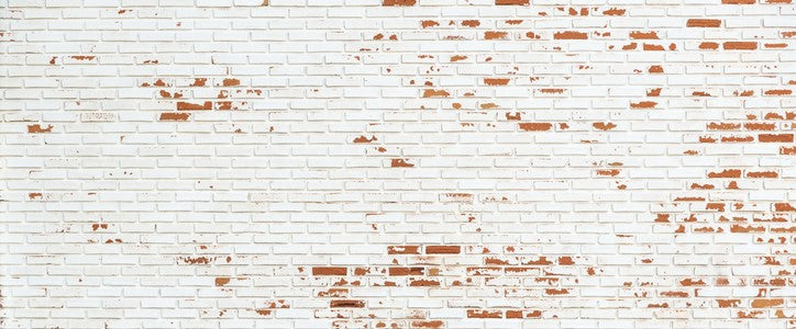 Comment fixer une charge lourde sur un mur en brique ?